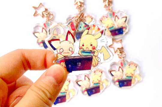 Pikachu and Pichu Playing Switch Charms (2inch Clear Acrylic)