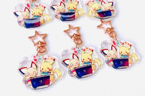 Pikachu and Pichu Playing Switch Charms (2inch Clear Acrylic)